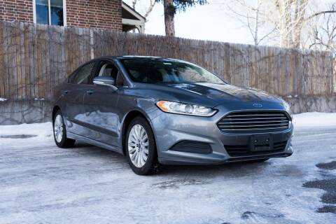 2014 Ford Fusion Hybrid for sale at Friends Auto Sales in Denver CO