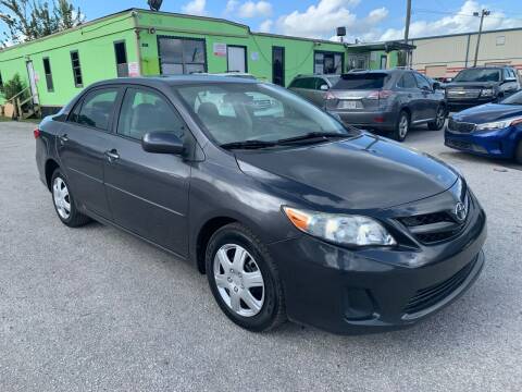 2011 Toyota Corolla for sale at Marvin Motors in Kissimmee FL