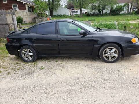 2004 Pontiac Grand Am for sale at Northwoods Auto & Truck Sales in Machesney Park IL