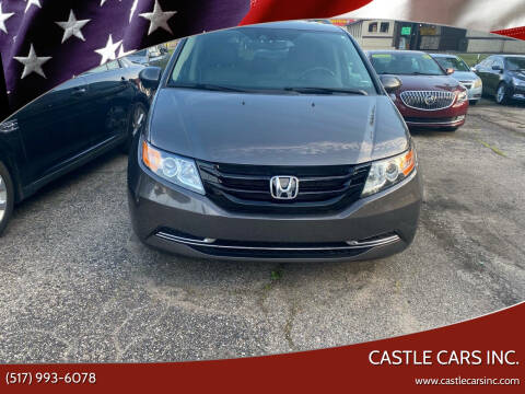 2016 Honda Odyssey for sale at Castle Cars Inc. in Lansing MI