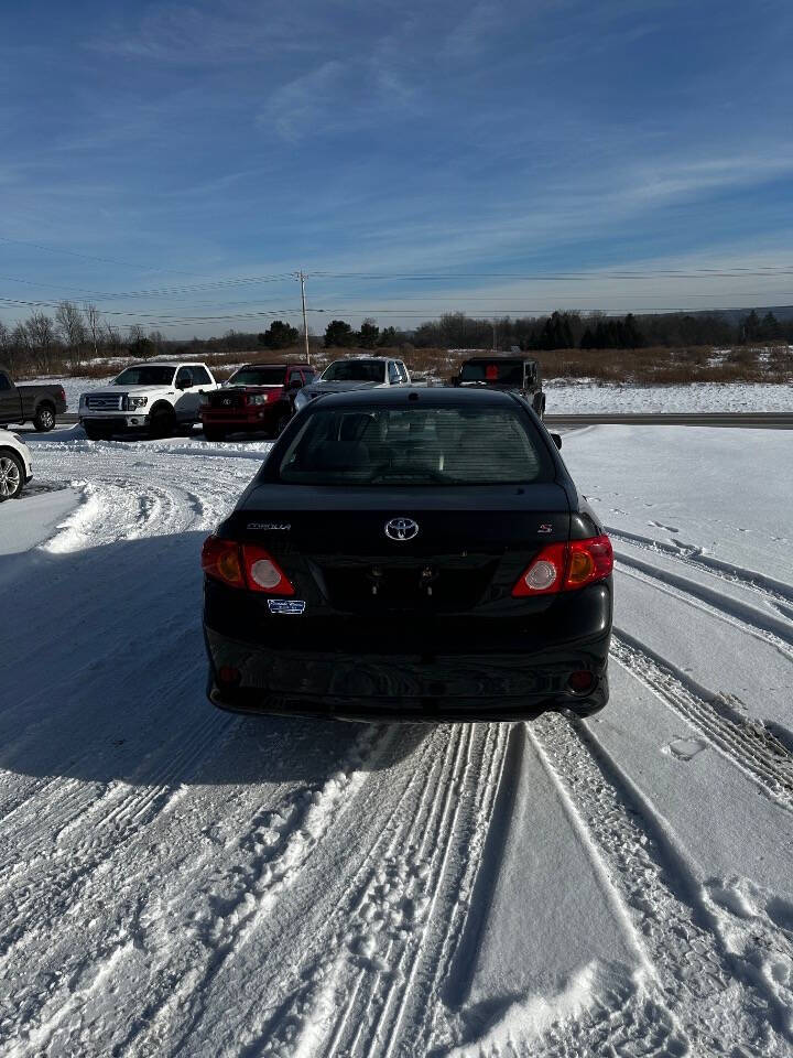 2009 Toyota Corolla for sale at Riverside Motors in Glenfield, NY