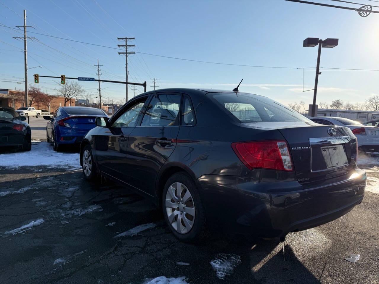 2009 Subaru Impreza for sale at AVS AUTO GROUP LLC in CLEVELAND, OH