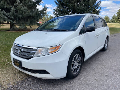 2011 Honda Odyssey for sale at BELOW BOOK AUTO SALES in Idaho Falls ID