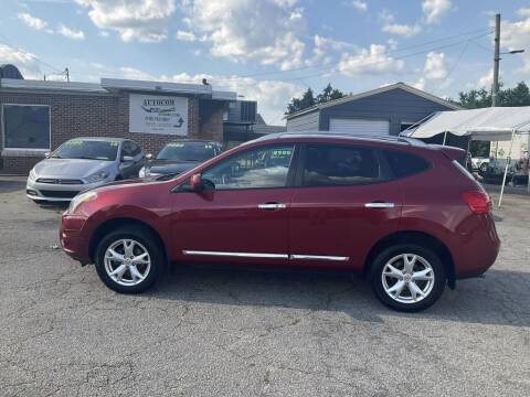 2011 Nissan Rogue for sale at Autocom, LLC in Clayton NC