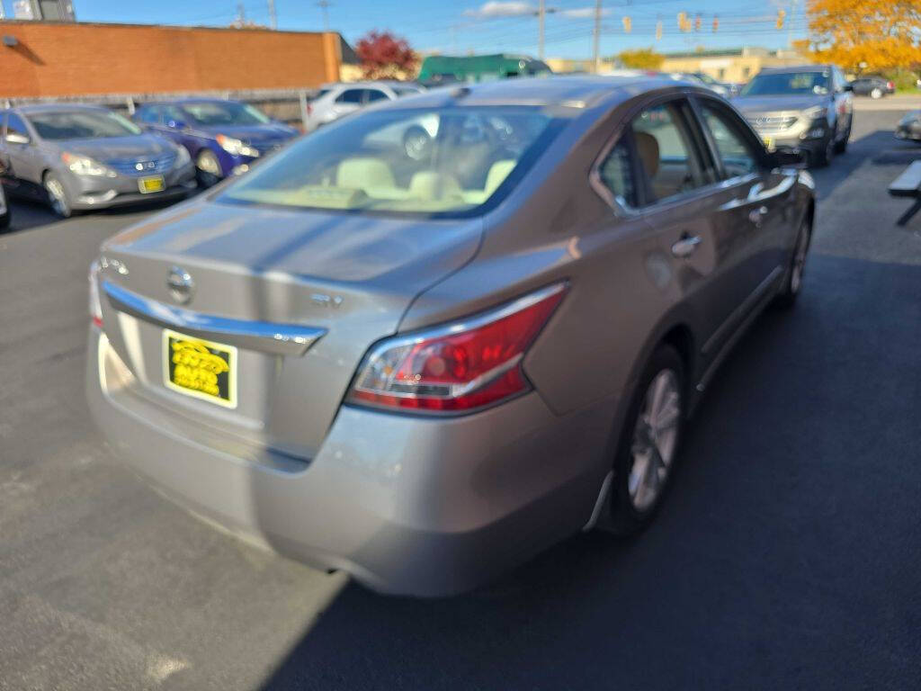 2015 Nissan Altima for sale at ENZO AUTO in Parma, OH