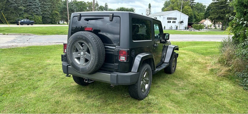 2013 Jeep Wrangler for sale at Zolinski Auto Sale in Saginaw, MI