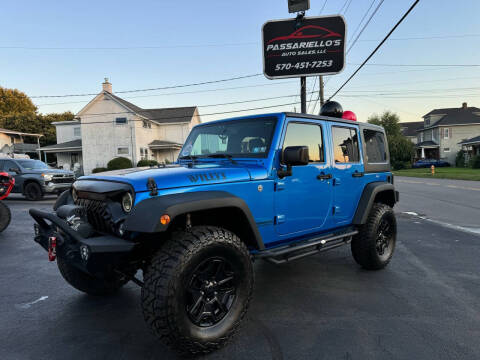 2016 Jeep Wrangler Unlimited for sale at Passariello's Auto Sales LLC in Old Forge PA