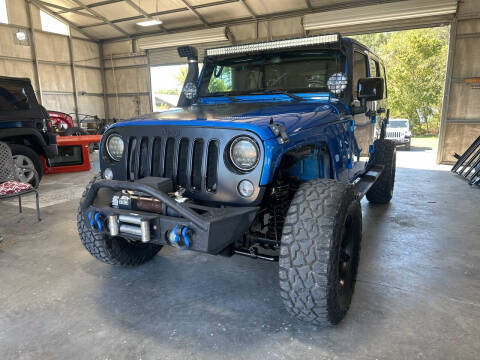 2014 Jeep Wrangler Unlimited for sale at Walker Family Automotive in Albertville AL