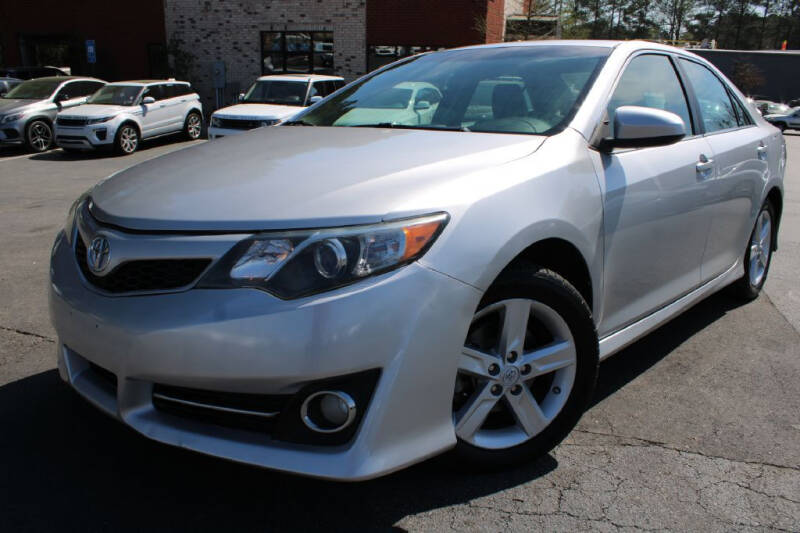 2013 Toyota Camry for sale at Atlanta Unique Auto Sales in Norcross GA