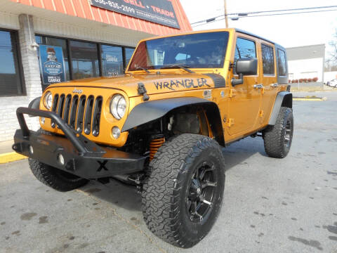 2014 Jeep Wrangler Unlimited for sale at Super Sports & Imports in Jonesville NC