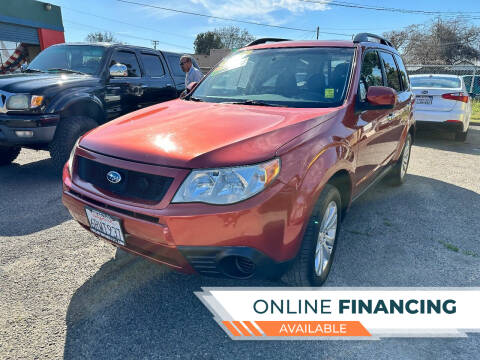 2011 Subaru Forester for sale at Freeway Motors Used Cars in Modesto CA