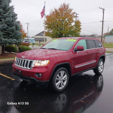 2013 Jeep Grand Cherokee for sale at Ideal Auto Sales, Inc. in Waukesha WI