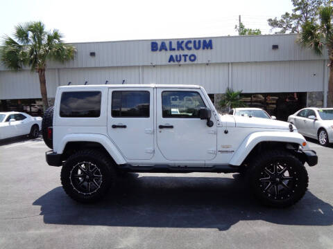 2014 Jeep Wrangler Unlimited for sale at BALKCUM AUTO INC in Wilmington NC