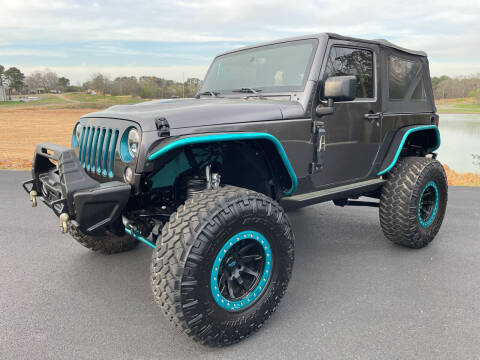 2016 Jeep Wrangler for sale at BILL HANCOCK MOTORS LLC in Albertville AL