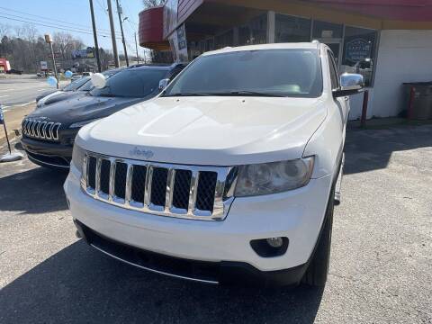 2011 Jeep Grand Cherokee for sale at CU Carfinders in Norcross GA