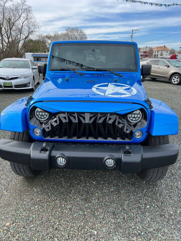 2014 Jeep Wrangler Unlimited for sale at Gutberlet Automotive in Lowell OH