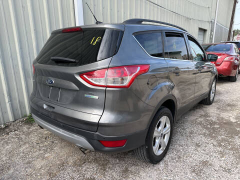 2014 Ford Escape for sale at CHEAPIE AUTO SALES INC in Metairie LA