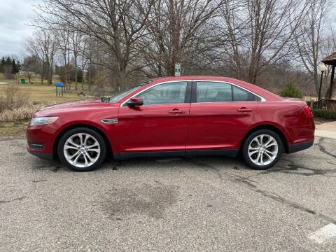 2013 Ford Taurus for sale at Family Auto Sales llc in Fenton MI