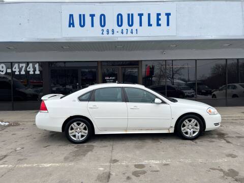 2009 Chevrolet Impala for sale at Auto Outlet in Des Moines IA
