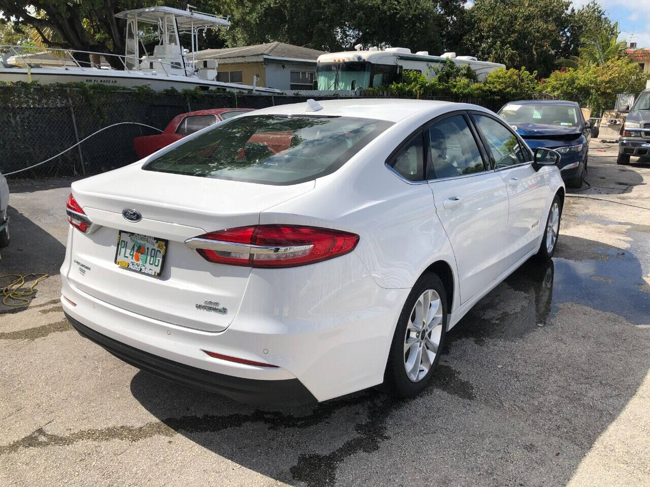 2019 Ford Fusion Hybrid  - $15,500