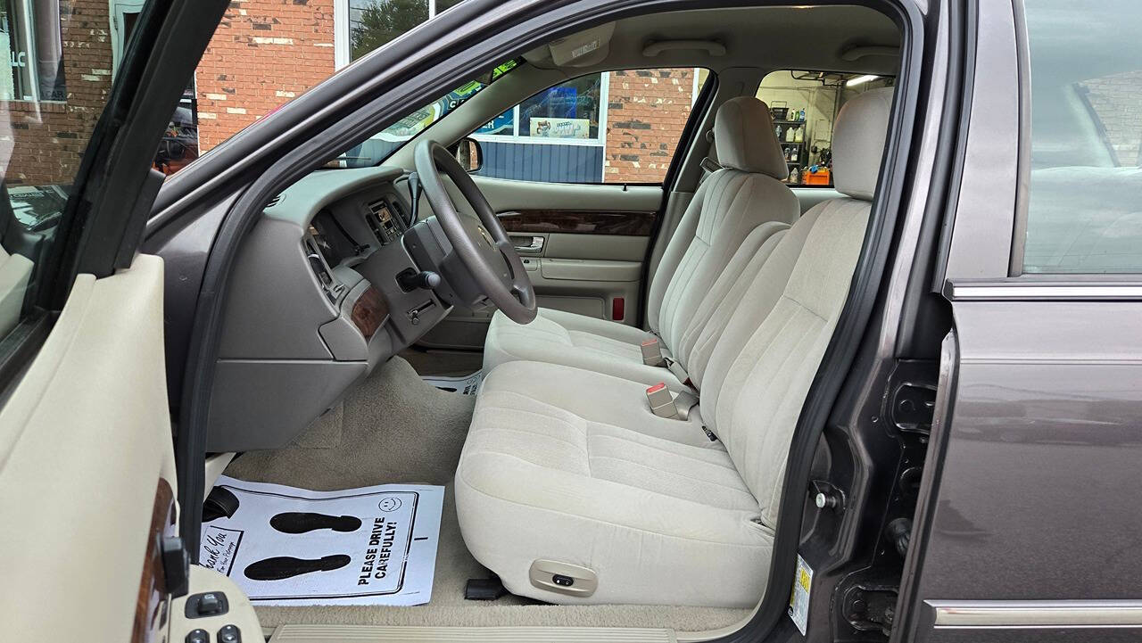 2007 Mercury Grand Marquis for sale at North Ridge Auto Center LLC in Madison, OH