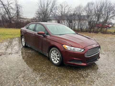 2015 Ford Fusion for sale at HEDGES USED CARS in Carleton MI