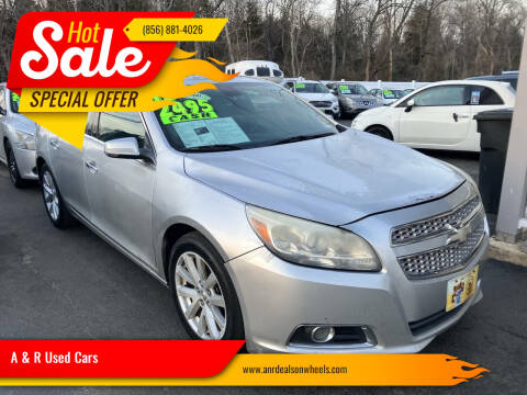 2013 Chevrolet Malibu for sale at A & R Used Cars in Clayton NJ