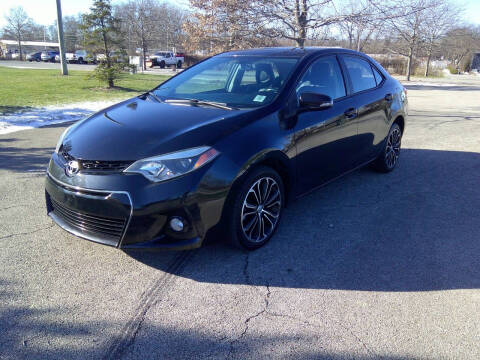 2014 Toyota Corolla for sale at Triangle Auto Sales in Elgin IL