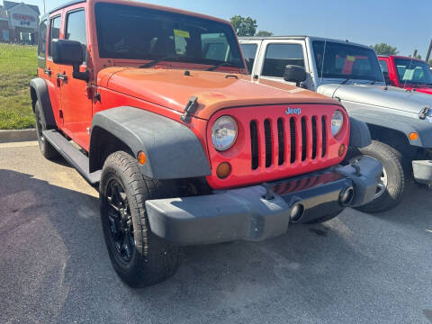 2013 Jeep Wrangler Unlimited for sale at Postal Pete in Galena IL