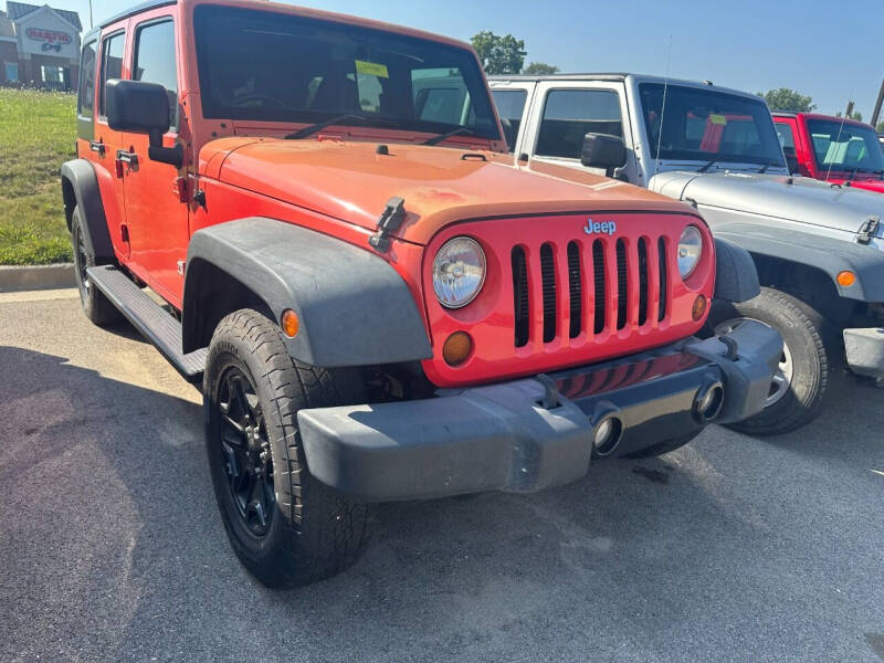 2013 Jeep Wrangler Unlimited for sale at Postal Pete in Galena IL