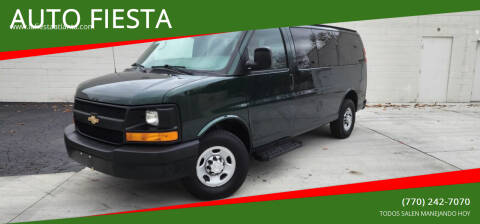 2014 Chevrolet Express for sale at AUTO FIESTA in Norcross GA