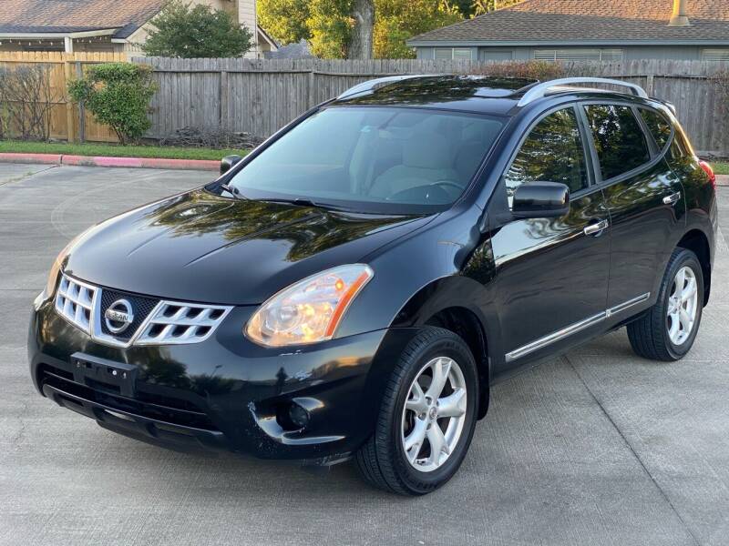 2011 Nissan Rogue for sale at KM Motors LLC in Houston TX