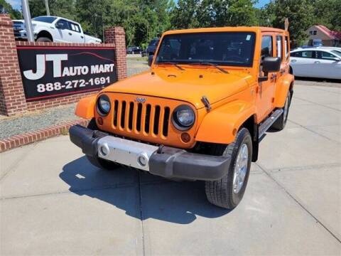 2012 Jeep Wrangler Unlimited for sale at J T Auto Group in Sanford NC