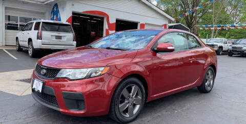 2010 Kia Forte Koup for sale at Hensley Auto Group in Middletown OH