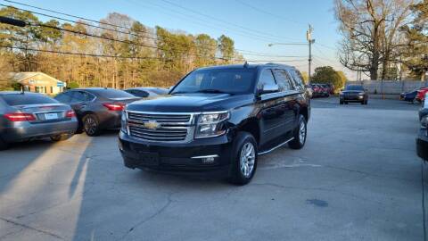 2015 Chevrolet Tahoe for sale at DADA AUTO INC in Monroe NC