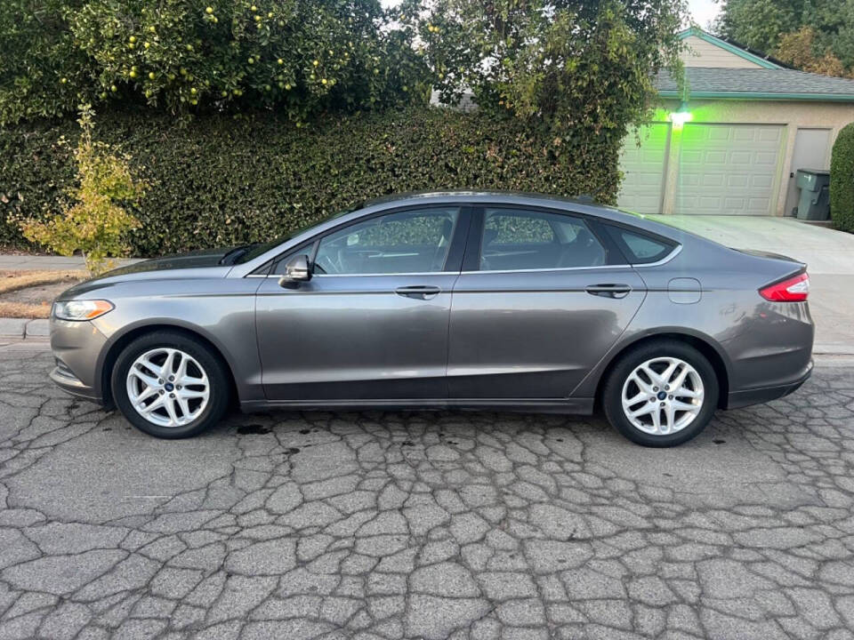 2014 Ford Fusion for sale at AUTO 4 LESS in Fresno, CA