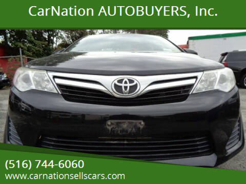 2013 Toyota Camry for sale at CarNation AUTOBUYERS Inc. in Rockville Centre NY