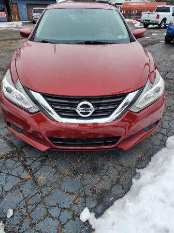 2017 Nissan Altima for sale at Rombaugh's Auto Sales in Battle Creek MI