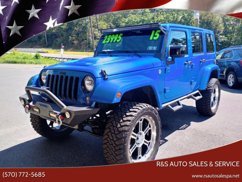 2015 Jeep Wrangler Unlimited Altitude's photo