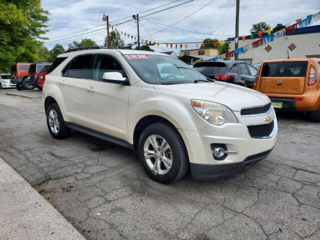 2014 Chevrolet Equinox for sale at DAGO'S AUTO SALES LLC in Dalton, GA