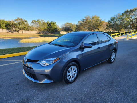 2014 Toyota Corolla for sale at Carcoin Auto Sales in Orlando FL