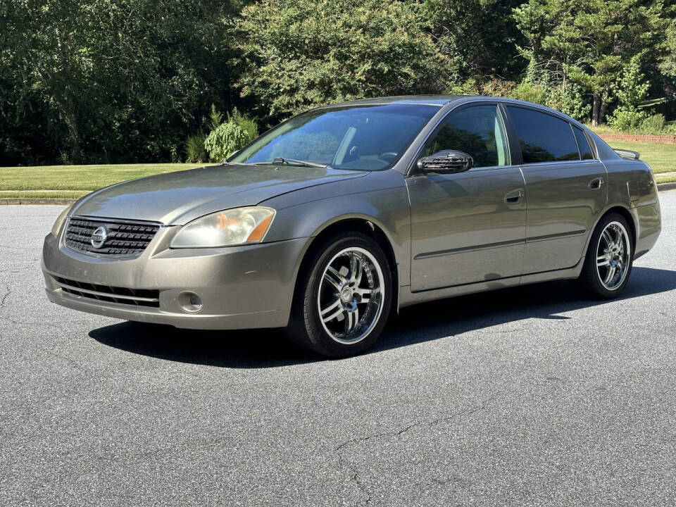 2004 Nissan Altima for sale at SHURE AUTO SALES in Snellville, GA