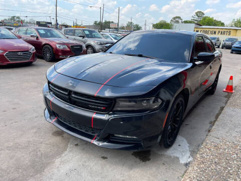 2015 Dodge Charger for sale at Sam's Auto Sales in Houston TX