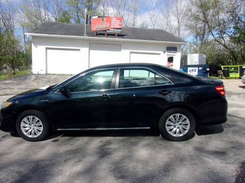 2012 Toyota Camry Hybrid for sale at Northport Motors LLC in New London WI