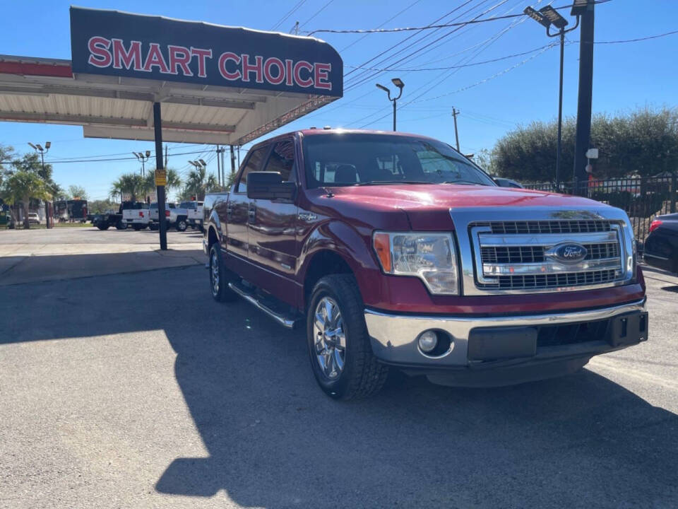 2014 Ford F-150 for sale at SMART CHOICE AUTO in Pasadena, TX