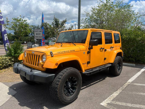 2012 Jeep Wrangler Unlimited for sale at Bay City Autosales in Tampa FL