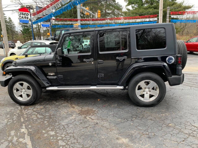 2009 Jeep Wrangler Unlimited for sale at Chuckie Bizzarro's Fleetwing Auto in Erie, PA