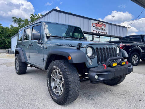 2014 Jeep Wrangler Unlimited for sale at Carworks in Osage Beach MO