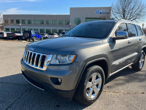2011 Jeep Grand Cherokee for sale at Suburban Auto Sales LLC in Madison Heights MI