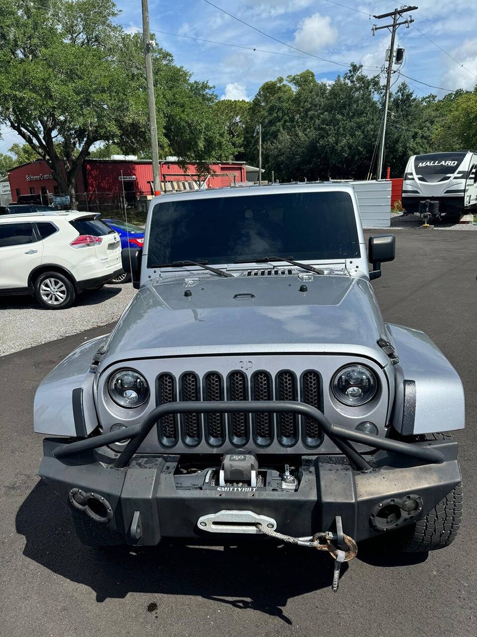 2014 Jeep Wrangler Unlimited for sale at PLANTATION MOTORS in Tampa, FL